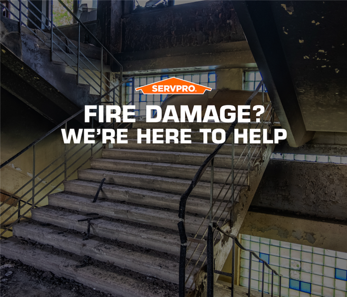 SERVPRO commercial fire damage sign, we are here to help.